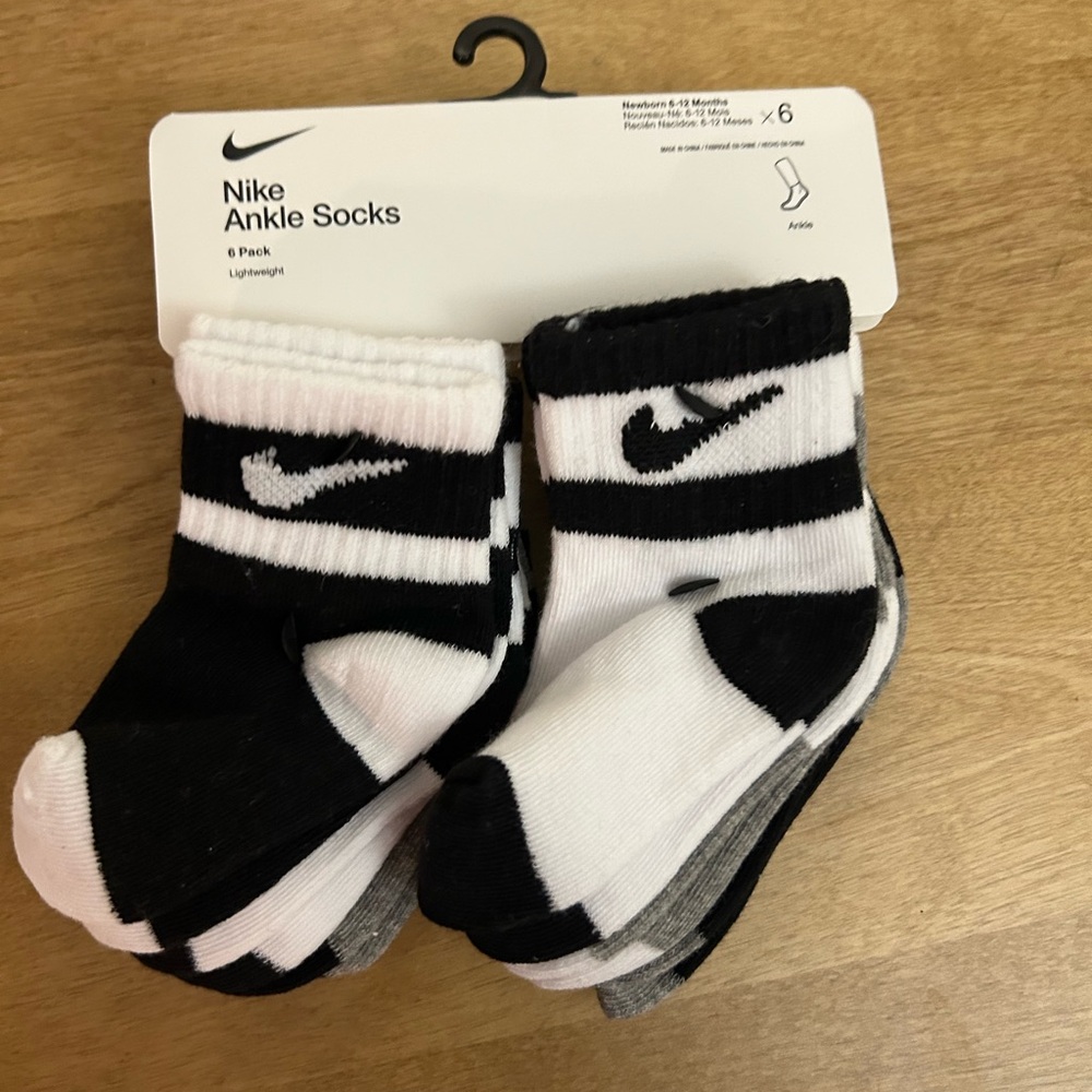 Brand new never worn Nike socks 6-12 months
